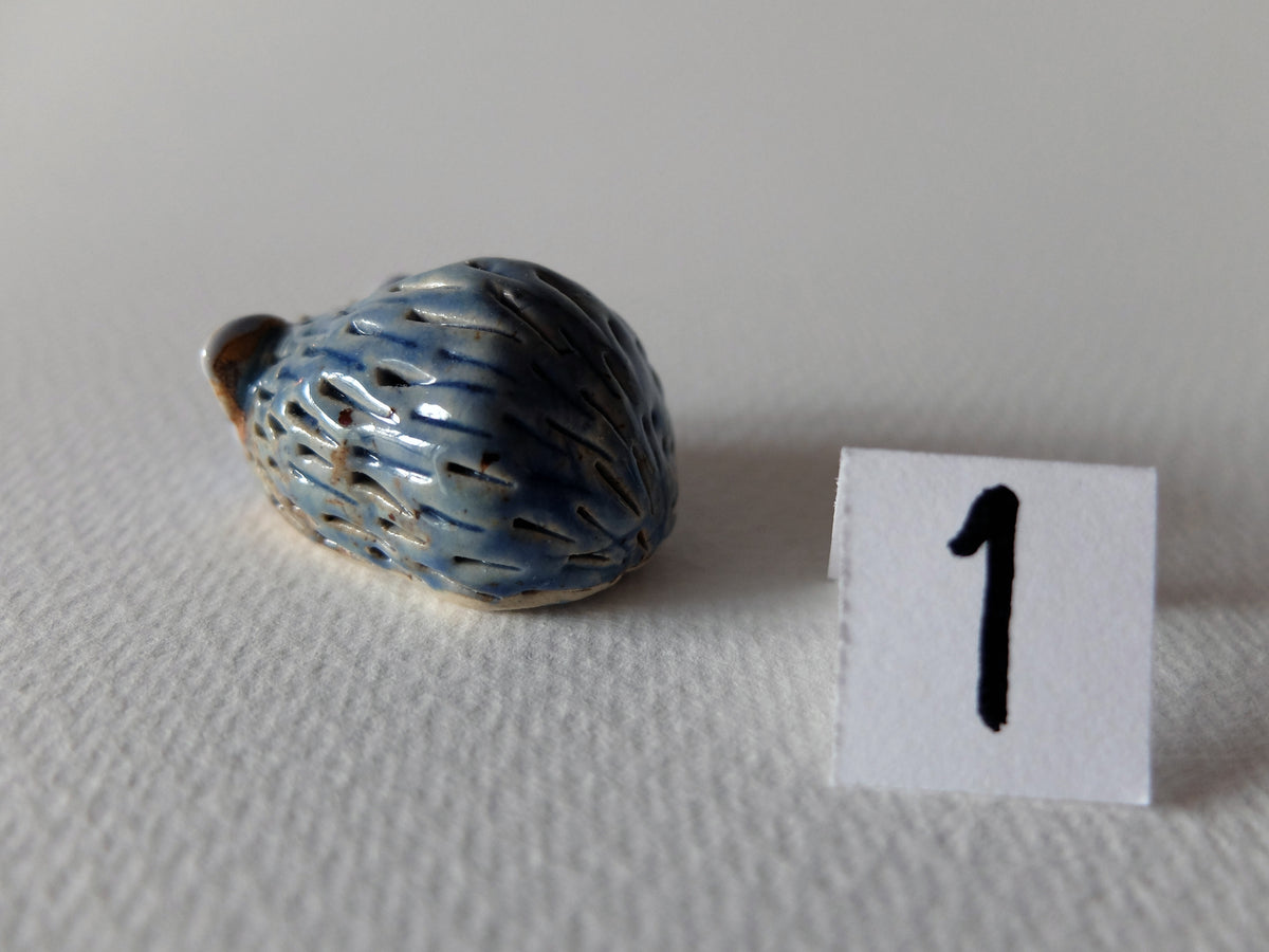 The Timid Jade-Gazer (#1) – Handcrafted Ceramic Hedgehog