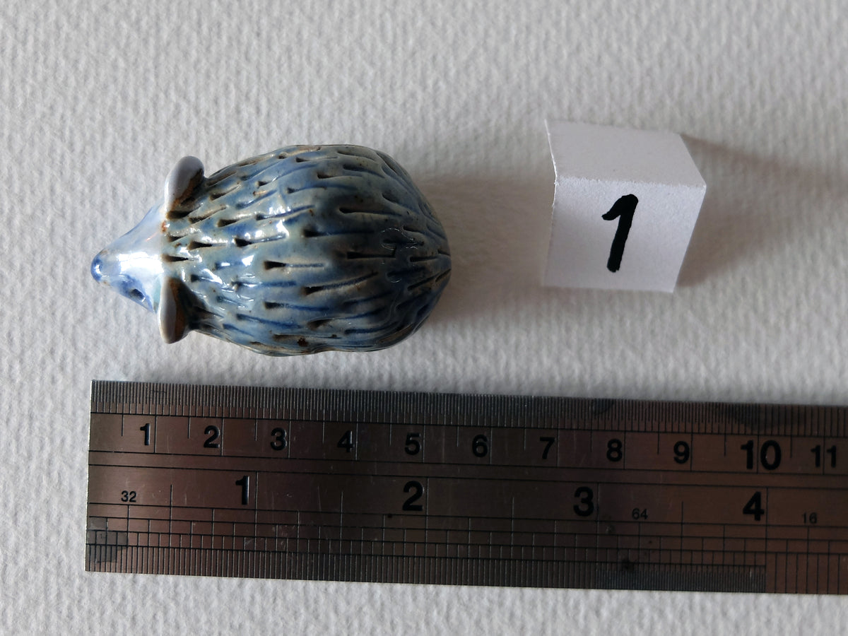 The Timid Jade-Gazer (#1) – Handcrafted Ceramic Hedgehog