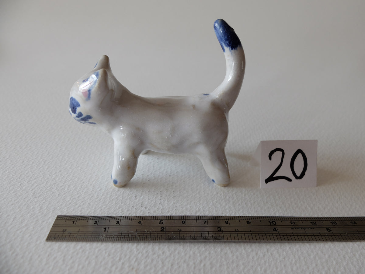 The Curious White Cat (#20) – Handcrafted Ceramic Animal Figurine